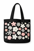hand embroidered tote with attached purse. white and pink flowers on a black linen background. Made in India by a Women's fair trade collective.