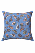 Decorative pillow with hand embroidered fish pattern on a blue background. Made in India by a women's fair trade collective.
